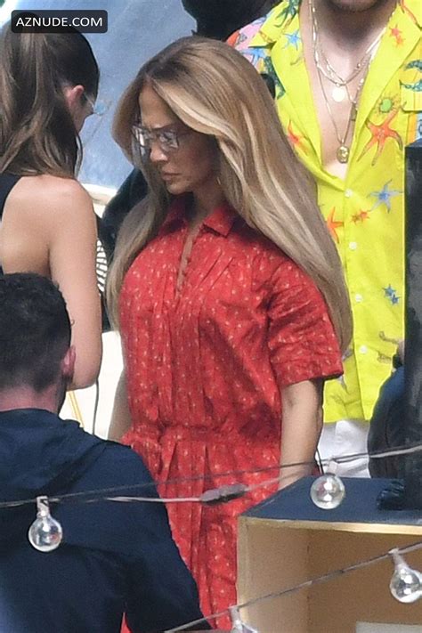 Jennifer Lopez Sexy Wears A Revealing Red Dress As She Gets Back To