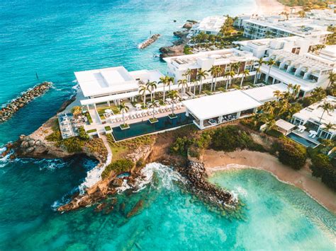four seasons anguilla aerial of sunset pool a one way ticket