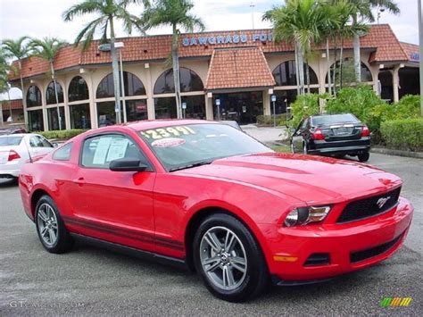red candy metallic ford mustang  premium coupe  photo  gtcarlotcom car
