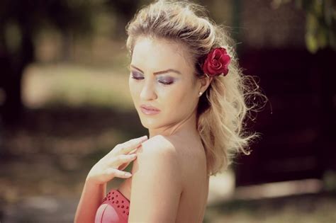 portrait of sensual blonde with a flower in her hair free image download