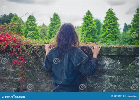 young woman   wall stock photo image