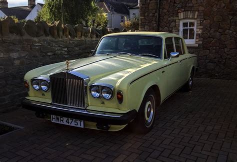 yellow rolls royce picture  cathedral  cardiff