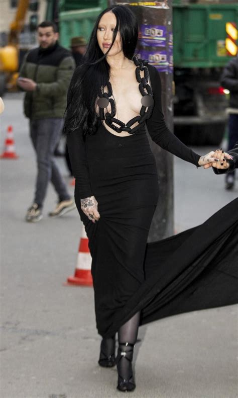 noah cyrus wears plunging nipple baring gown with chain necklace at