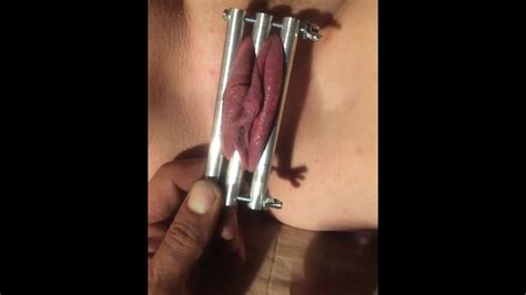 stretching her clamped pussy lips free porn ac xhamster