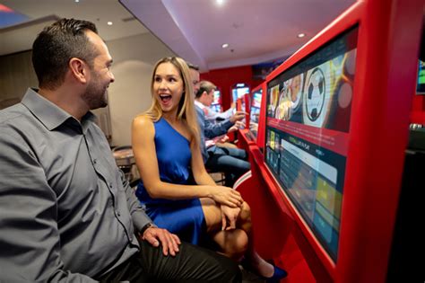 Excited Woman Expressing Her Surprise After Winning At Sports Betting