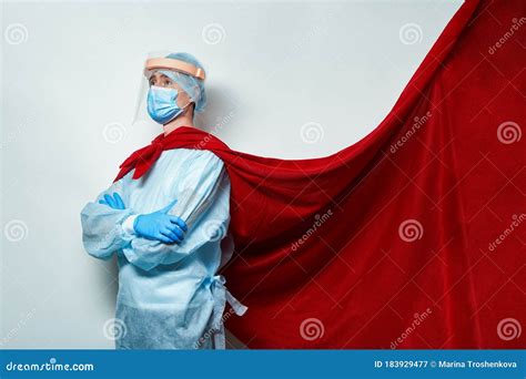 doctor wearing surgical face mask  superhero cape stock image