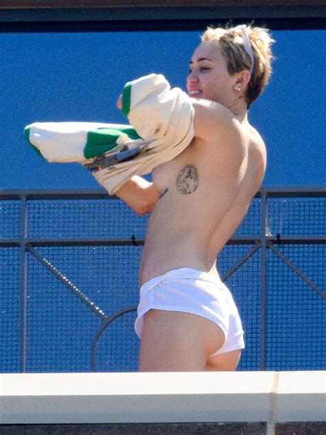 naked miley cyrus in topless on a hotel balcony in sydney