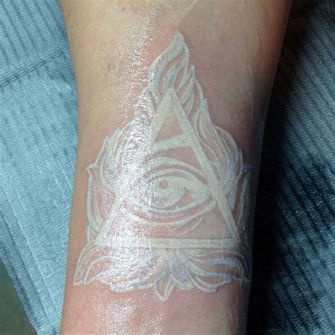 Awesome White Ink Colored Masonic Pyramid Tattoo On Arm Tattooimages