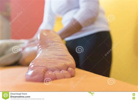 woman having sports foot massage in spa salon stock image image of