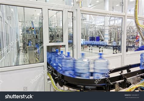 modern industrial shop  pouring mineral water stock photo  shutterstock