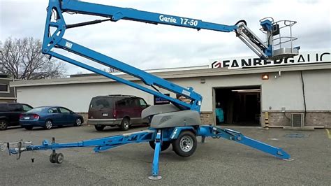 genie tz  trailer mounted articulating boom lift youtube