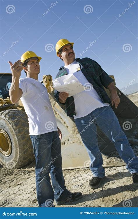 men working  construction site royalty  stock photography image