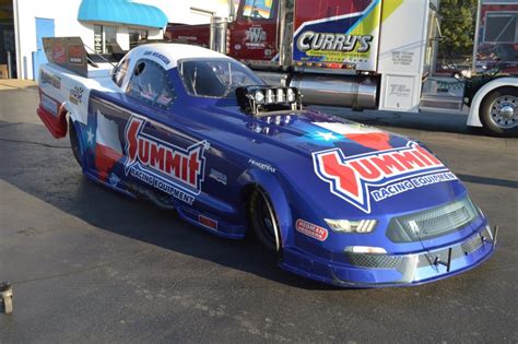 nhra funny car  wear special summit racing texas livery  aaa texas