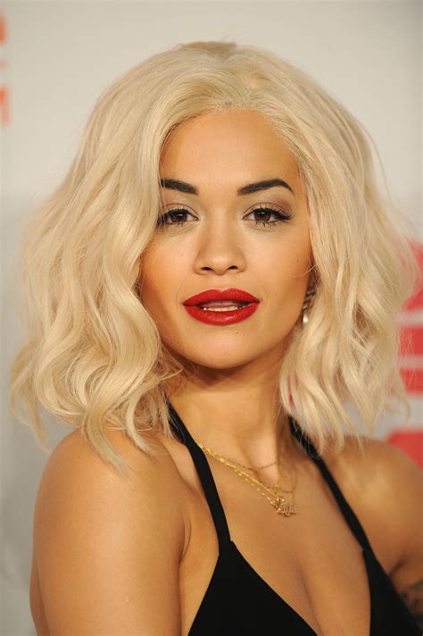 rita ora s new bleached hair paired perfectly with a red lip and all