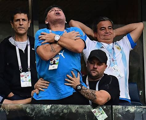 diego maradona celebration argentina icon supported by bodyguard after