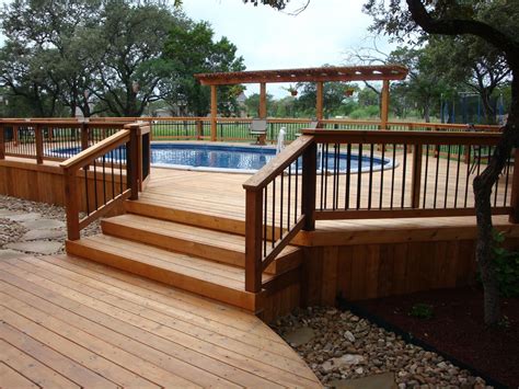 oval  ground pool  wooden deck entrance bexar county deckbuildingonabudget