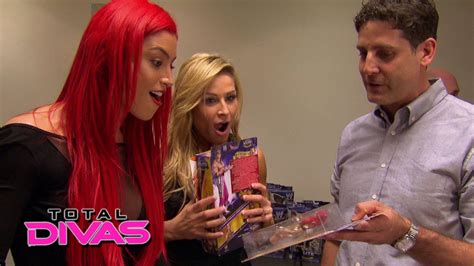 The Divas Check Out Their New Mattel Action Figures Total