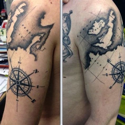 big black ink nautical map tattoo on shoulder area tattooimages