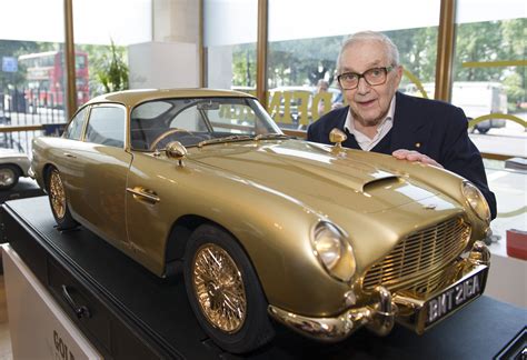gold aston martin db model car sells   autoevolution