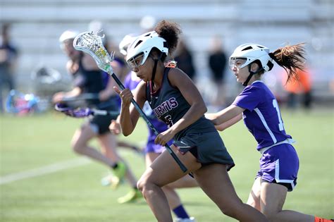 concussion worries rise girls lacrosse turns  headgear   york times