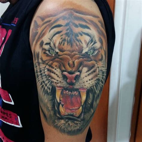 30 Aggressive Tiger Face Tattoo Made Ever