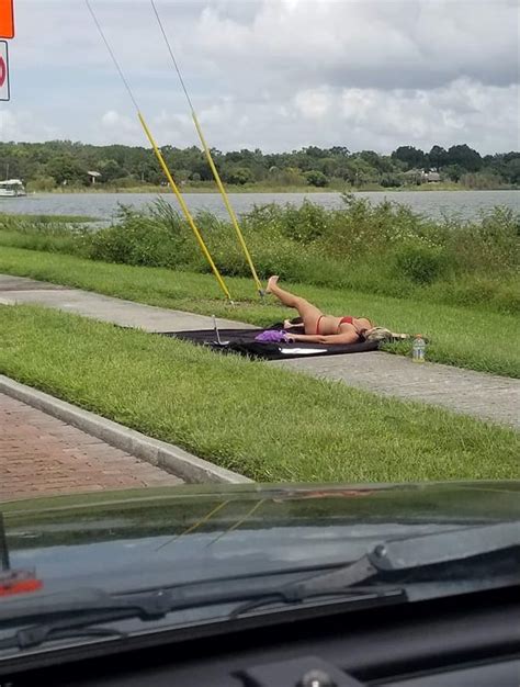 Sunbathing In A Thong On The Side Of A Public Road Near A