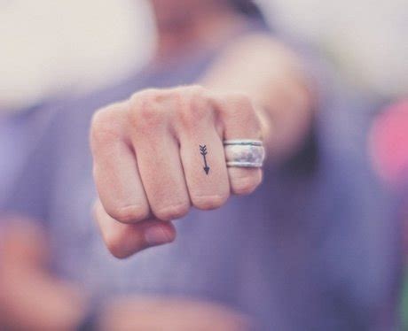 tiny tattoos miniature arrow  impossibly tiny tattoos   parents popbuzz
