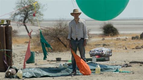 man in 100 balloons camping chair flight bbc news