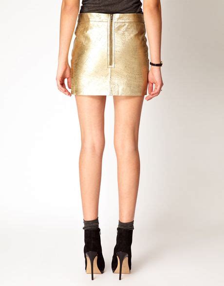 Ganni Leather Mini Skirt In Gold In Gold Golden Lyst