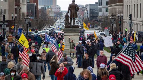 protesters converge  capitol  protest michigan stay home order