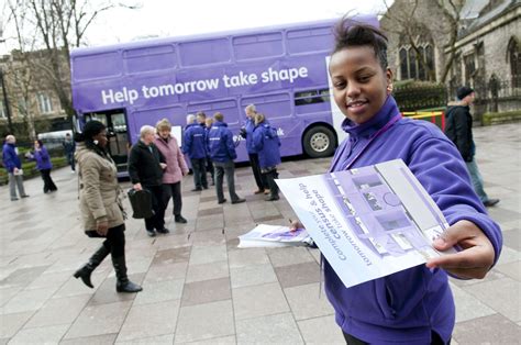 handing  leaflets    census purple bus cardif flickr