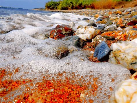 areia vermelha na praia surpreendente foto de stock imagem de selvagem vazio