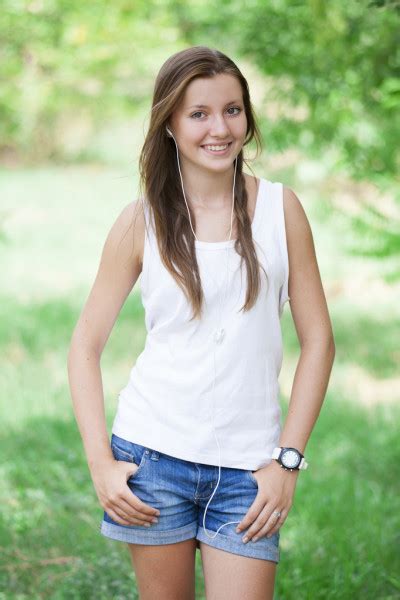 Beautiful Brunette Girl With Country Look Outdoors Shot