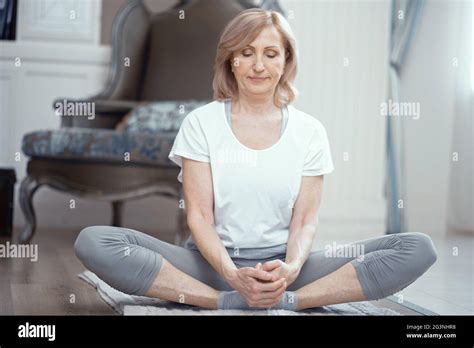 woman sitting breathing  res stock photography  images alamy