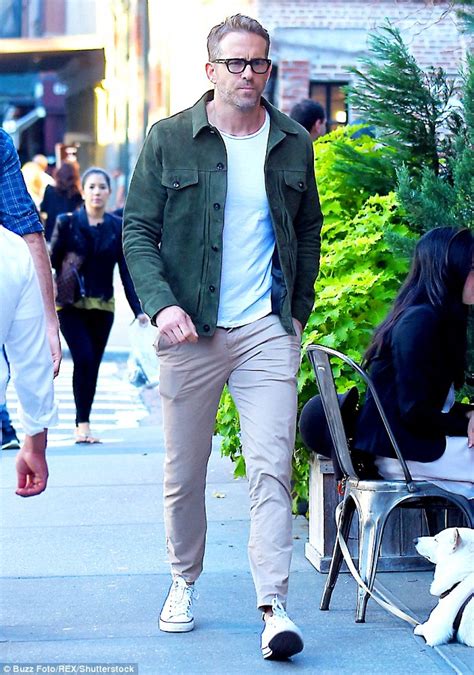 ryan reynolds sports nerd glasses as he strolls in nyc without wife