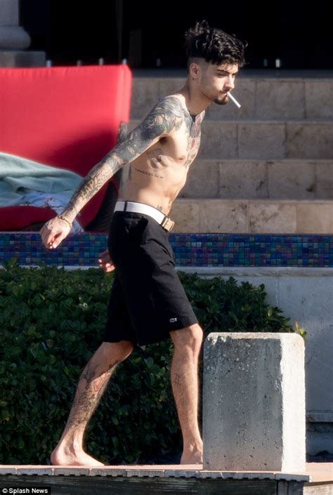 shirtless zayn malik shows off his heavily inked torso daily mail online