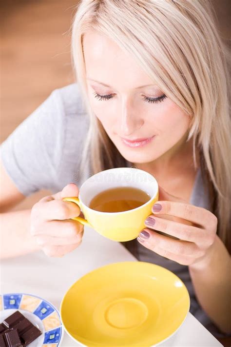 drinking tea stock image image  person indoors interior