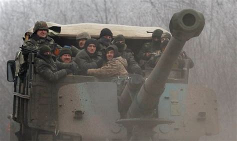 ukraine cease fire goes into effect but rebel leader in key town