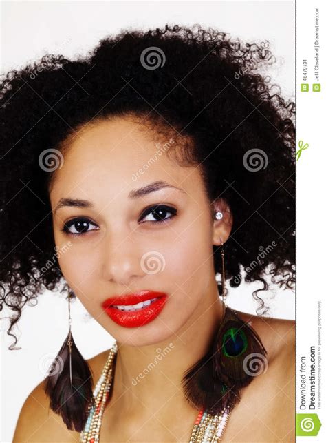 close portrait of light skinned black woman stock image