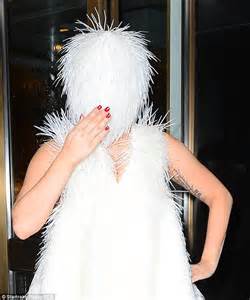 Lady Gaga Swaps Her Engulfing White Costume For Bra And