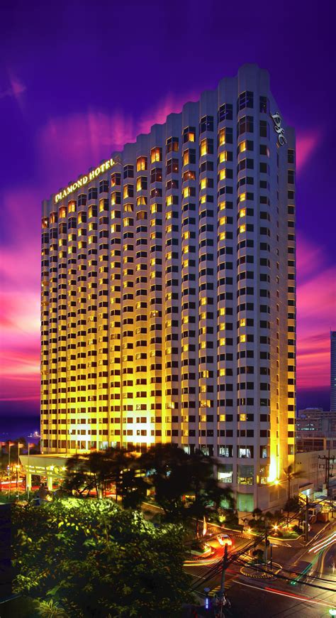 diamond hotel philippines facade  dusk hotels   philippines manila philippines hotels