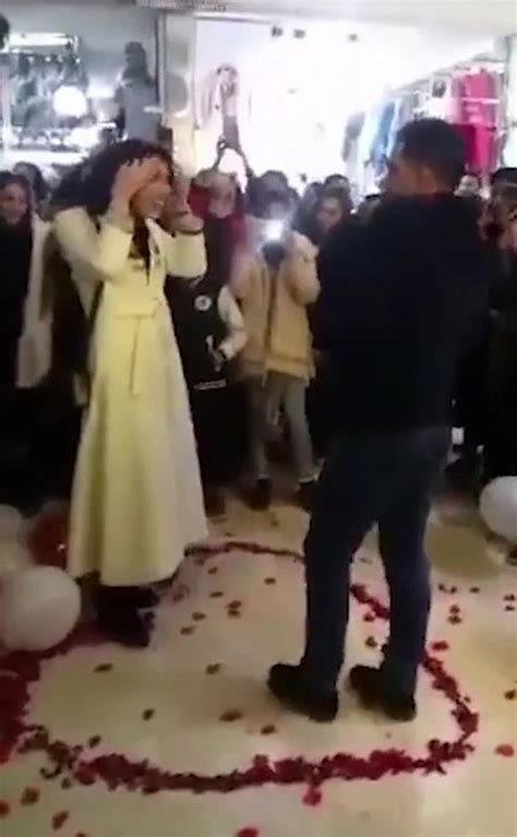 couple arrested in iran over romantic shopping mall proposal that