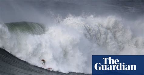 Surfers Tackle Big Waves At Portugal S Praia Do Norte In Pictures