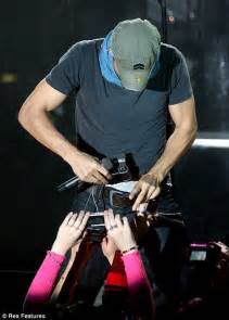 heart throb enrique iglesias takes a picture down his trousers for a fan daily mail online