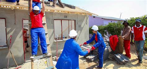 group  volunteers rebuilding homes  disaster areas working solutions