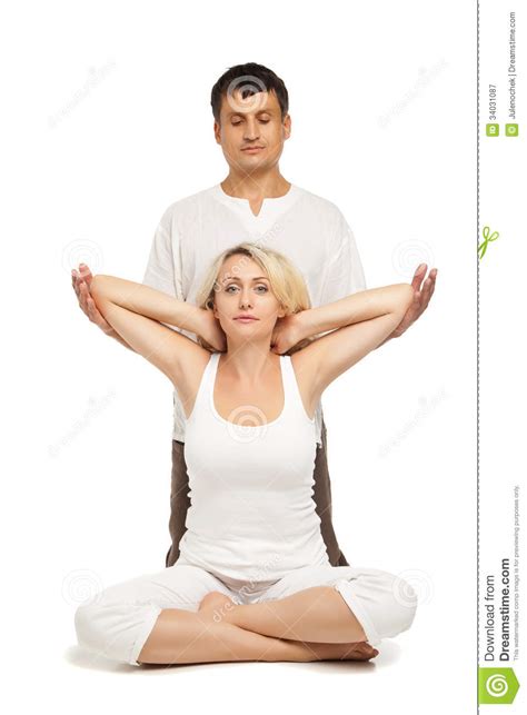 female receiving traditional thai massage stock image