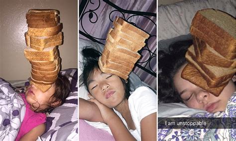 sister gets revenge by stacking a loaf of bread on her sleeping sibling s face daily mail online