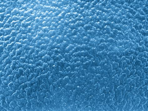 light blue textured glass  bumpy surface picture  photograph