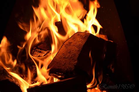 photo spear burning wood