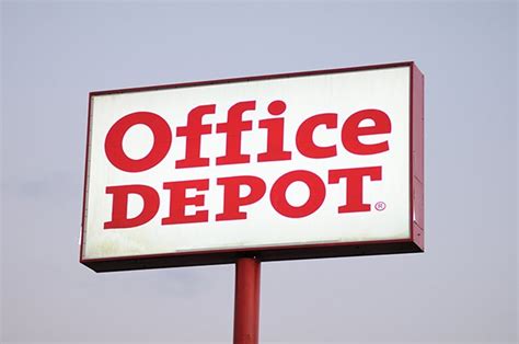 resilient   office depot adopts poison pill opi office